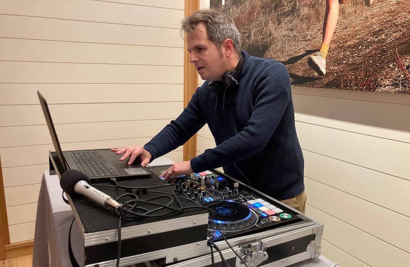 DJ Single Handed playing music at a fashion show at Athleta in Bryn Mawr, Pennsylvania.